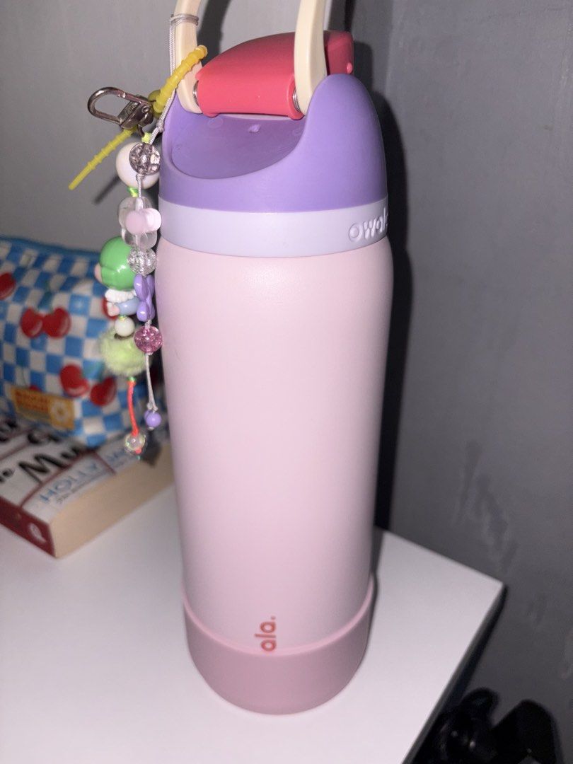 Owala Purple Blossom Bunny 32oz (Category: Water Bottles & Tumblers) located in Cavite. Submitted by madeleineguillermo (Listing ID 1460135053, Image 2). Description: - Cute pink and purple Owala water bottle - Easy to carry with a top handle - Ideal for staying hydrated and showing off your love for cute characters pwede ko po i-remove yung stickers if prefer na clean lang yung tumbler .