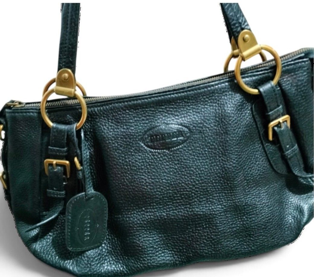 Pepper Black Pebbled Bag (Category: Shoulder Bags) located in Caloocan City. Submitted by gentlewolf_c9431a (Listing ID 1460300350, Image 3). Description: Prada inspired - Uk leather - Brand: Pepper - Color: Black - Material: Pebbled texture - Hardware: Gold-tone - Style: Classic shoulder bag - Condition: Good, pre-loved - Features: Chic pebbled finish, elegant gold accents - Meetup location: Primark Town Center Deparo, Caloocan City.