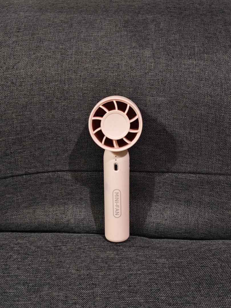 pink handheld mini turbine fan (Category: Fans) located in Bulacan. Submitted by angel.decluttersx (Listing ID 1460269369, Image 1). Description: unused freebie lang with max of 3 powers with box pa.