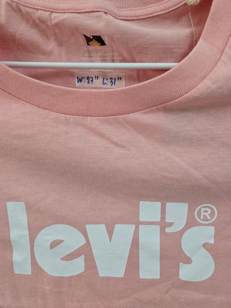 Pink Levi's T-shirt 3XL (Category: Shirts) located in Tarlac. Submitted by resaleclub (Listing ID 1460154850, Image 2). Description: - Pink Levi's T-Shirt - Size: 3XL - Measurements: Width 27", Length 31" - Made in Bangladesh - Features classic Levi's logo - Ideal for everyday casual outfits.