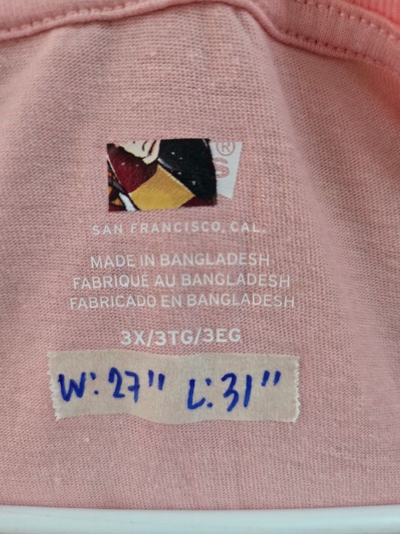 Pink Levi's T-shirt 3XL (Category: Shirts) located in Tarlac. Submitted by resaleclub (Listing ID 1460154850, Image 3). Description: - Pink Levi's T-Shirt - Size: 3XL - Measurements: Width 27", Length 31" - Made in Bangladesh - Features classic Levi's logo - Ideal for everyday casual outfits.