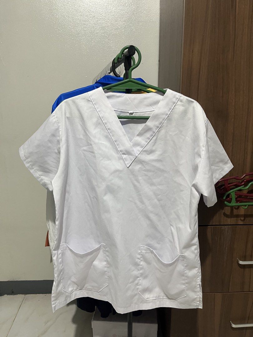 Plain White Scrubs Set (Category: Sets or Coordinates) located in Baguio. Submitted by kawiiii (Listing ID 1460262008, Image 1). Description: Bought from Bambang RFS: Currently using hospital scrubs *Price can still be negotiated* *Has small stains on pants*.