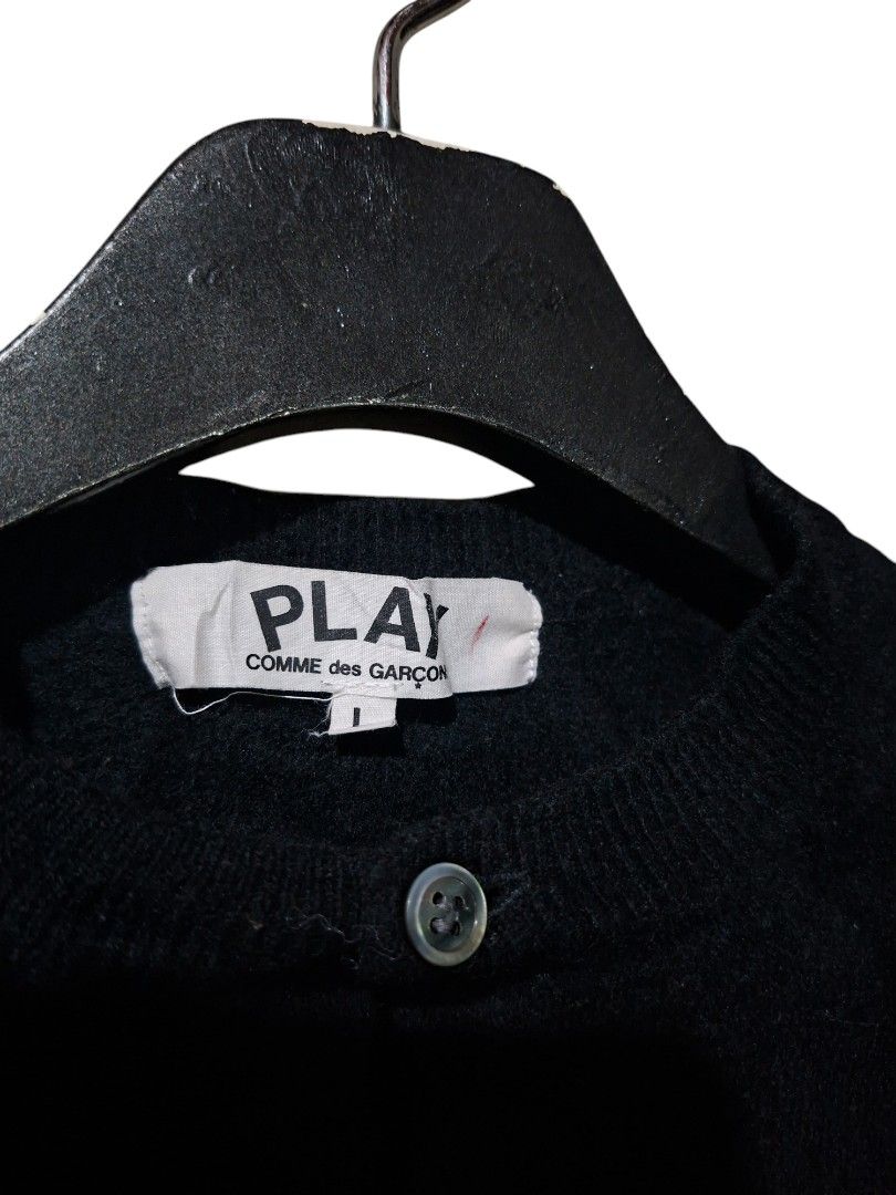 PLAY COMME des GARÇONS Cardigan (Authentic/Legit) (Category: Luxury Apparel) located in Leyte. Submitted by jpsrvd19 (Listing ID 1460237278, Image 3). Description: - PLAY COMME des GARÇONS Black Cardigan (Authentic/Legit) - Iconic double heart logo embroidered on chest - Button-up front - Made in Japan - Size: L - Ideal for layering.