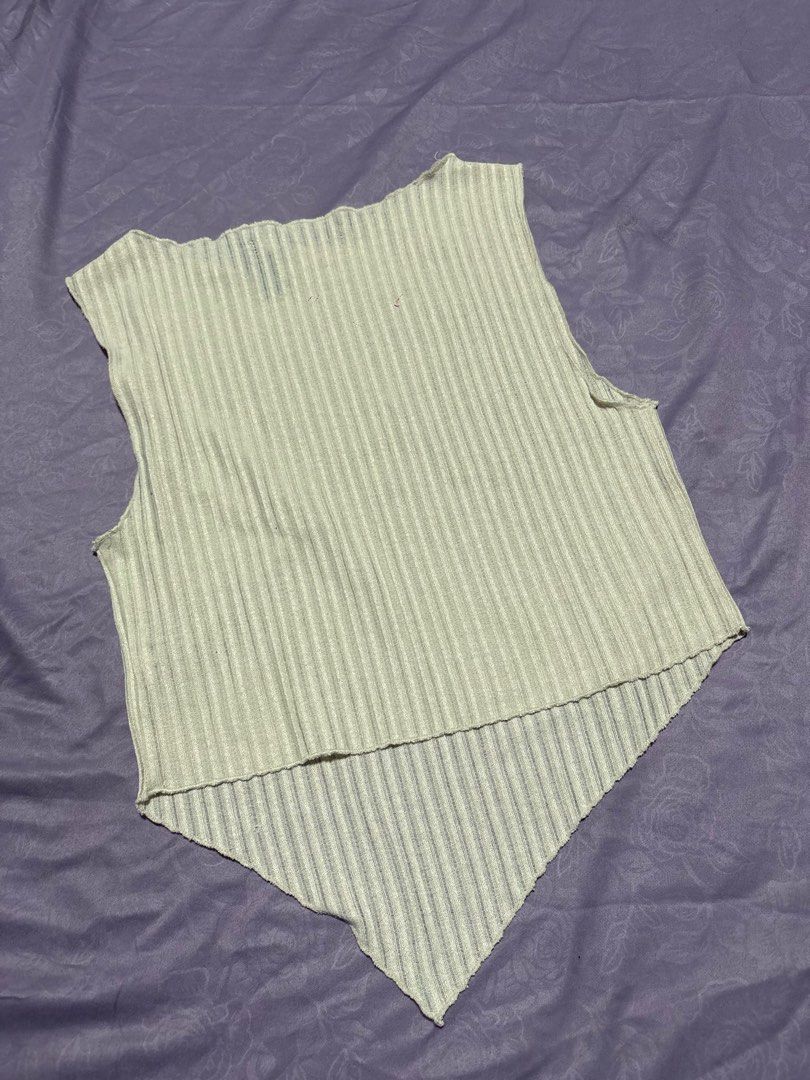 Pleated Knit Top (Category: Blouses) located in Pasay City. Submitted by nicoletlntn_ (Listing ID 1460235156, Image 2). Description: - Cream colored knit top - Short sleeves - Crew neck - Stretchy, ribbed material - Estimated size: Small to Medium - Perfect for layering or wearing on its own - Simple and versatile piece.