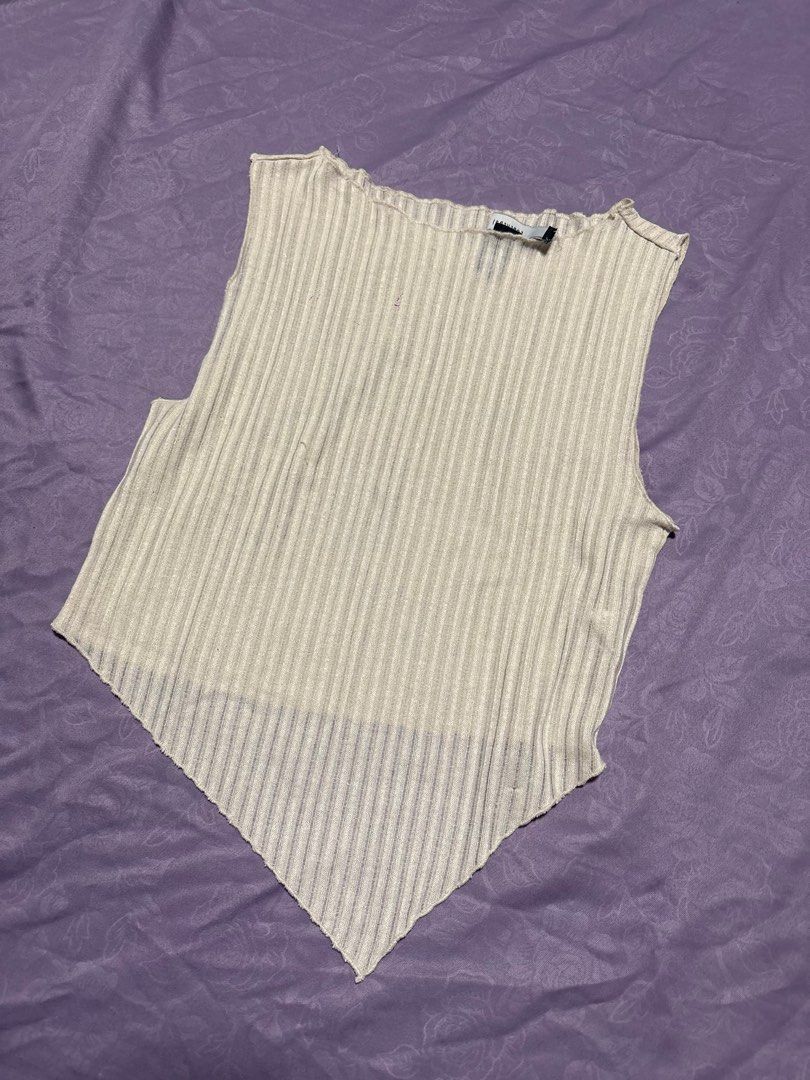 Pleated Knit Top (Category: Blouses) located in Pasay City. Submitted by nicoletlntn_ (Listing ID 1460235156, Image 1). Description: - Cream colored knit top - Short sleeves - Crew neck - Stretchy, ribbed material - Estimated size: Small to Medium - Perfect for layering or wearing on its own - Simple and versatile piece.