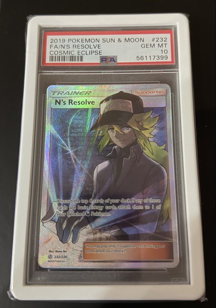 Pokemon 2019 Pokemon N's Resolve FA Cosmic Eclipse PSA 10 (Category: Raw Singles) located in Quezon City. Submitted by cookiesyy (Listing ID 1460287993, Image 1). Description: - 2019 Pokemon Sun & Moon N's Resolve Full Art Card - Set: Cosmic Eclipse (232/236) - Grading: PSA GEM MT 10 - Card Effect: Discard top 6 cards of your deck. If any are basic Energy, attach them to 1 of your Benched Pokemon. - Play Restriction: You can only play 1 Supporter