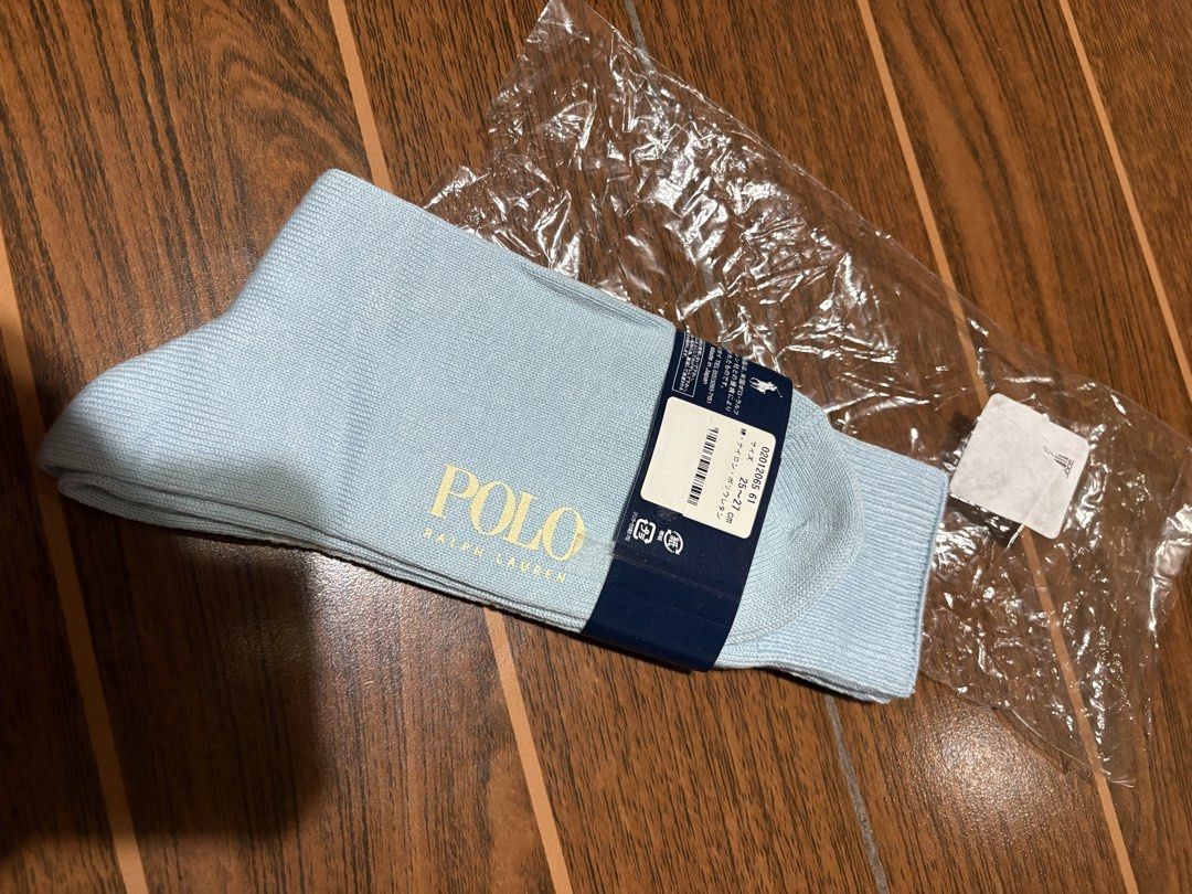 Polo Ralph Lauren Socks (25-27cm) (Category: Socks) located in Bulacan. Submitted by love2loved (Listing ID 1460262044, Image 2). Description: - Light blue Polo Ralph Lauren socks - Classic plaid pattern - Features iconic Polo logo - Size: 25-27cm - Made in Japan - Comes in original packaging.