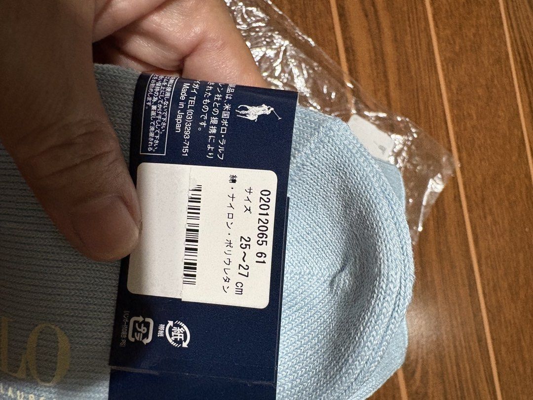 Polo Ralph Lauren Socks (25-27cm) (Category: Socks) located in Bulacan. Submitted by love2loved (Listing ID 1460262044, Image 3). Description: - Light blue Polo Ralph Lauren socks - Classic plaid pattern - Features iconic Polo logo - Size: 25-27cm - Made in Japan - Comes in original packaging.
