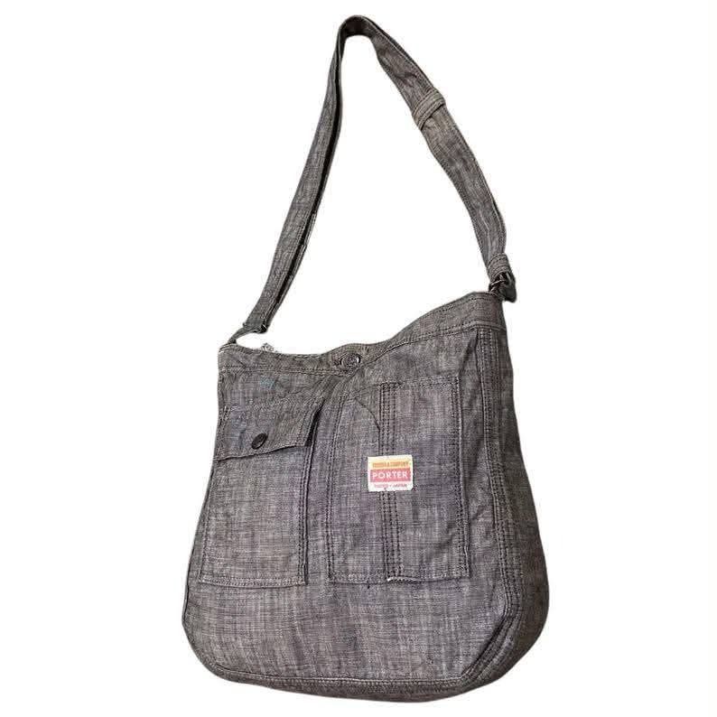 Porter Yoshida & Co. Denim Sling Bag (Category: Sling Bags) located in Manila. Submitted by theshopandsmile (Listing ID 1460190417, Image 3). Description: Details: 📌 Brand: PORTER Yoshida & Company 📌 Color: Blue chambray / washed denim 📌 Adjustable shoulder strap 📌 Front flap pocket + vertical pocket 📌 Top button closure 📌 Spacious interior for daily essentials Condition: Preloved – very good condition with normal signs of use (please refer