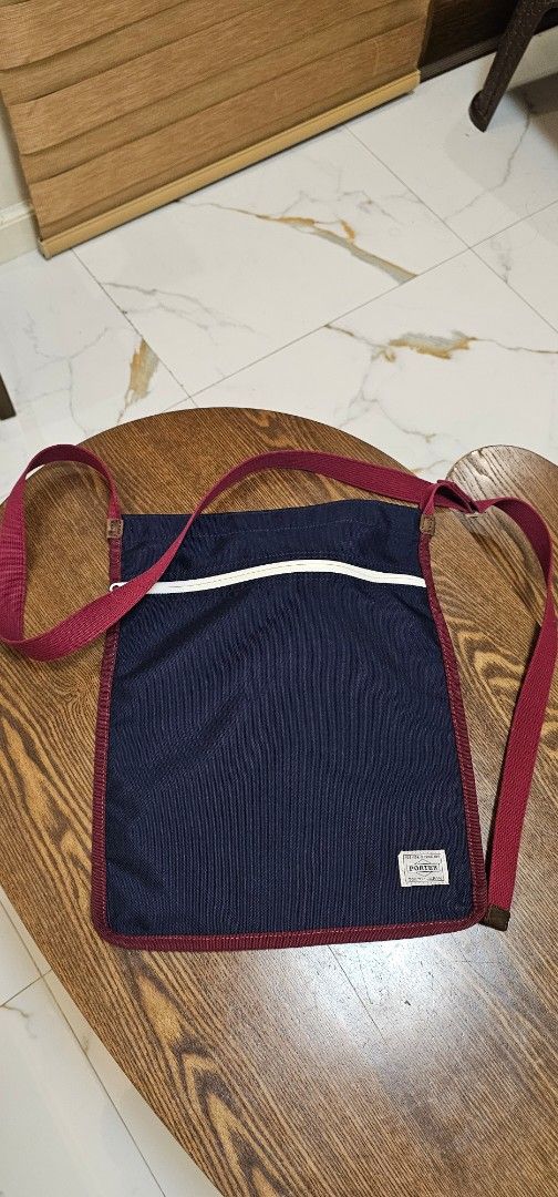 Porter Yoshida x Beams Sling Bag (Category: Sling Bags) located in Navotas City. Submitted by walburst (Listing ID 1460276576, Image 1). Description: Porter Yoshida x Beams Sling bag A4 size Made in Japan Good condition Can be used as Laptop sleeve (thin padding) *waterproofing membrane delamination *Tarnished slider buckle *ID patch removed.