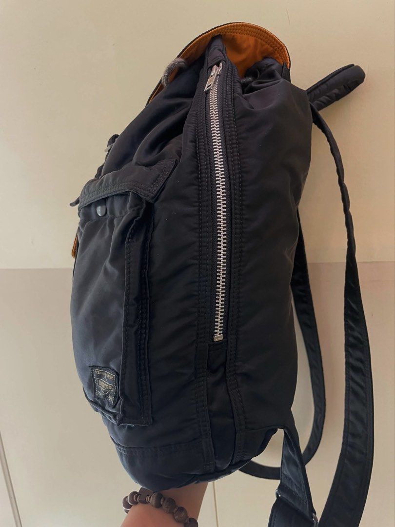 Porter-Yoshida & Co. Tanker Rucksack (Category: Backpacks) located in Manila. Submitted by thevintagebow (Listing ID 1460106389, Image 2). Description: Upgrade your daily style with the classic Porter-Yoshida & Co. Tanker Rucksack in classic black nylon. 💼 Complete with handy front pockets, a bright orange lining, and top-tier Japanese design, this is the ultimate everyday bag! 🖤 Price Comparison: Our Price: ₱5,000 PHP ONLY Local Market Retail: