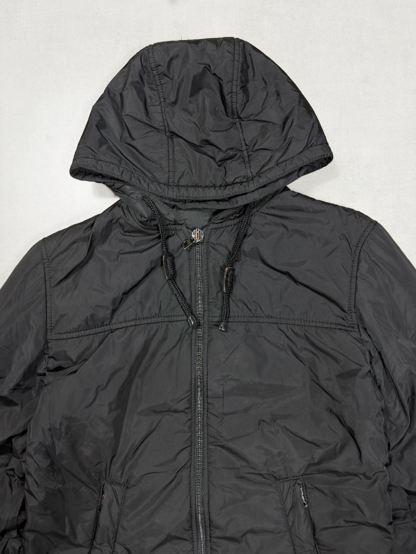 Prada- Vintage - Black Nylon Hoodie Down Jacket (Category: Luxury Apparel) located in Subic. Submitted by concretefloor (Listing ID 1460203784, Image 2). Description: Prada - Black Nylon Hoodie Down Jacket Size Small fits Medium 23 inches width 27 inches length Excellent condition Has scratch inside the jacket , can be fixed 9/10 condition Shipping fee not included Negotiable ; do not hesitate to make offer! .