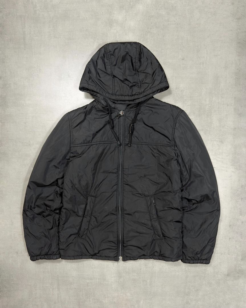 Prada- Vintage - Black Nylon Hoodie Down Jacket (Category: Luxury Apparel) located in Subic. Submitted by concretefloor (Listing ID 1460203784, Image 1). Description: Prada - Black Nylon Hoodie Down Jacket Size Small fits Medium 23 inches width 27 inches length Excellent condition Has scratch inside the jacket , can be fixed 9/10 condition Shipping fee not included Negotiable ; do not hesitate to make offer! .