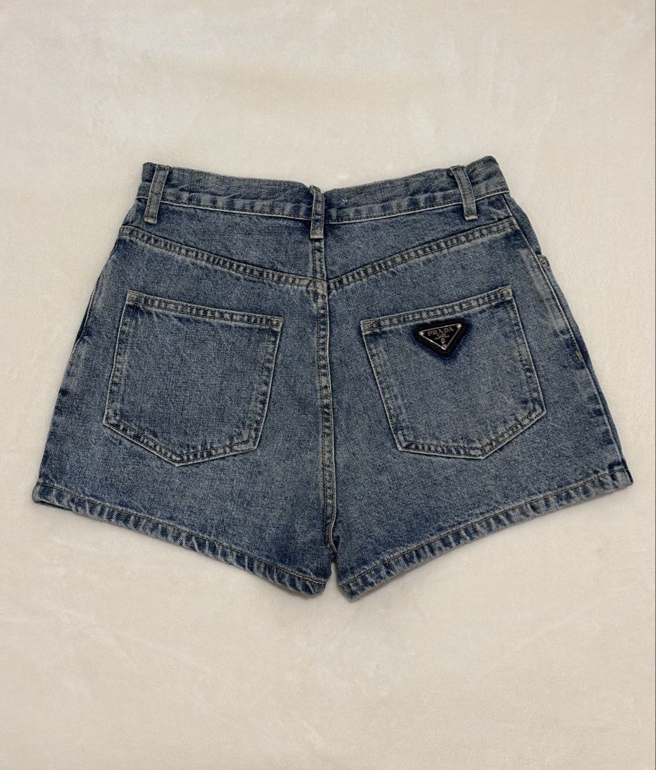 PRADA DENIM MOM SHORTS (Category: Shorts) located in Angeles City. Submitted by chic.haven (Listing ID 1460294084, Image 3). Description: - Authentic Prada Blue Denim Shorts - Sise 26-27 - Made in Italy - Iconic Prada Triangle Logo on Back Pocket - Perfect for Casual Wear.