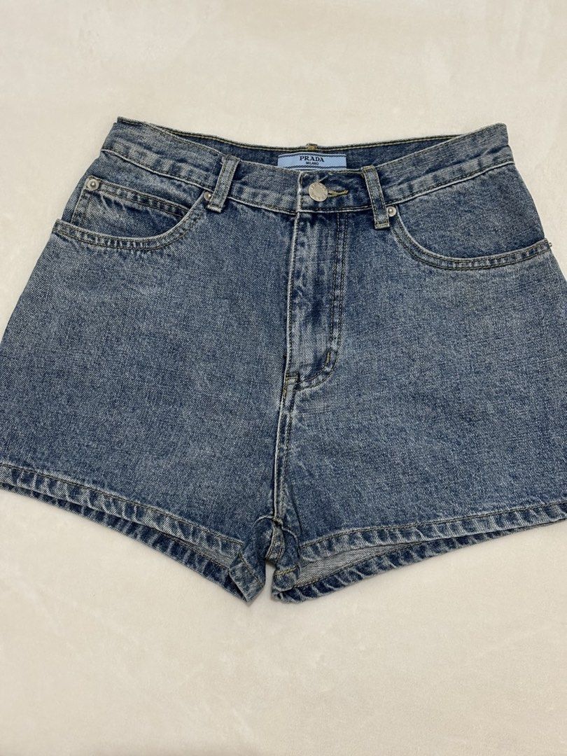PRADA DENIM MOM SHORTS (Category: Shorts) located in Angeles City. Submitted by chic.haven (Listing ID 1460294084, Image 2). Description: - Authentic Prada Blue Denim Shorts - Sise 26-27 - Made in Italy - Iconic Prada Triangle Logo on Back Pocket - Perfect for Casual Wear.