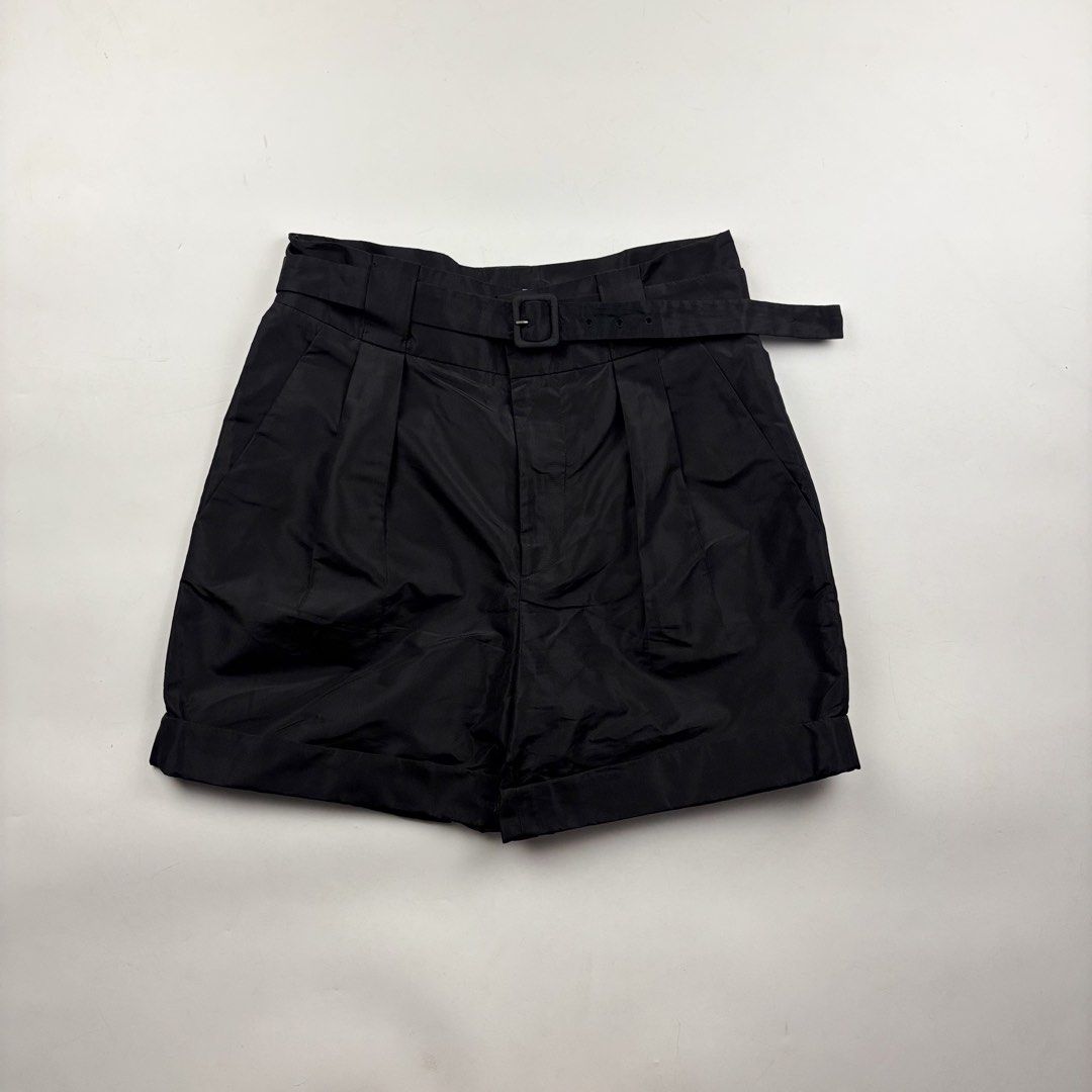 Prada High Waist Belted Pleated Shorts (Category: Shorts) located in Makati City. Submitted by ragrepository (Listing ID 1460247961, Image 1). Description: Prada High Waist Belted Pleated Shorts Tagged as 38 fits 27 waist. Waist-13.5 Front rise-13.5” Back rise-14.5” Inseam- Outseam-17.5” Thigh- Knee- Leg opening-11” Condition- 9.5/10 Flaw- None .