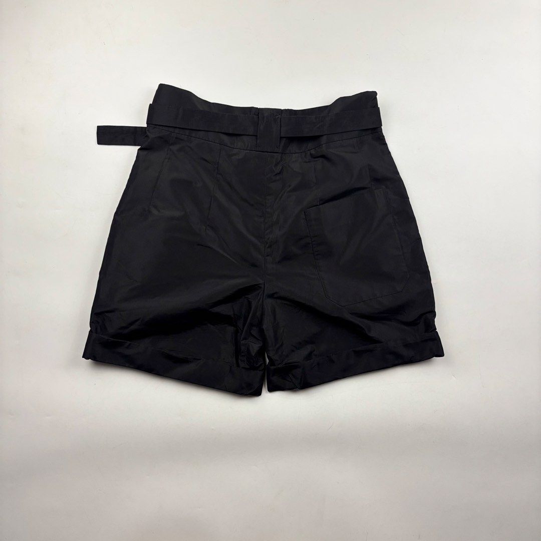 Prada High Waist Belted Pleated Shorts (Category: Shorts) located in Makati City. Submitted by ragrepository (Listing ID 1460247961, Image 2). Description: Prada High Waist Belted Pleated Shorts Tagged as 38 fits 27 waist. Waist-13.5 Front rise-13.5” Back rise-14.5” Inseam- Outseam-17.5” Thigh- Knee- Leg opening-11” Condition- 9.5/10 Flaw- None .