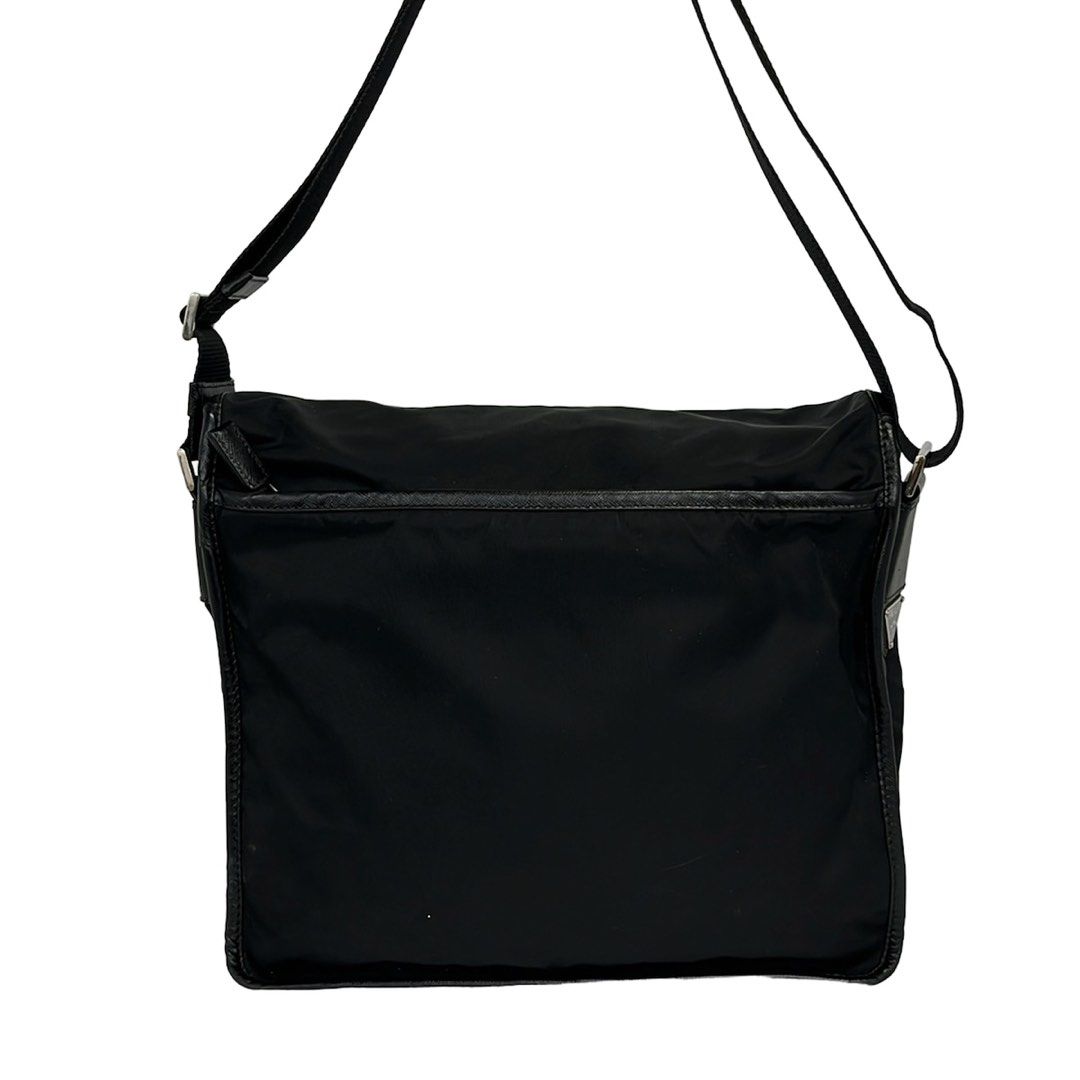 Prada Nylon Messenger Bag Black (Category: Luxury Bags & Wallets) located in Las Pinas. Submitted by daisuki_japan_luxury_by_reiko (Listing ID 1460120160, Image 3). Description: Condition Notes [Exterior] Overall ⇒ Scratches/Stains [Interior] Overall ⇒ Scratches/Stains brand PRADA Genre Shoulder bag Size indicated none Actual size Height: Approx. 27 cm, Width: Approx. 31.5 cm , Depth: Approx. 11 cm, Shoulder strap: Approx. 62 cm to the main body 