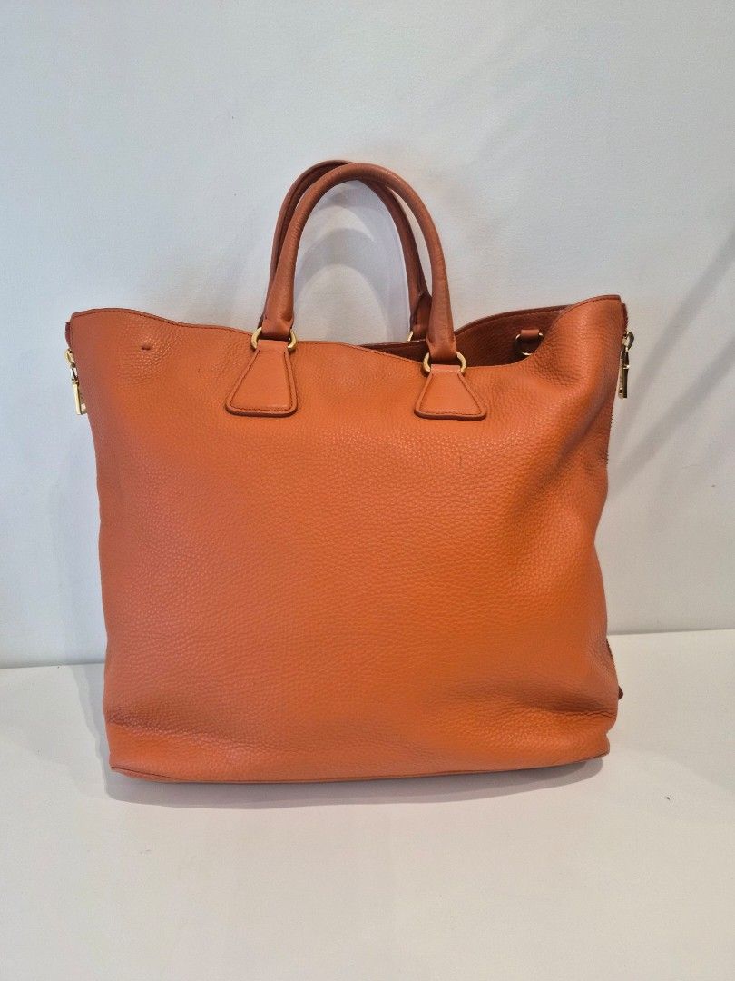 Prada Vitello Orange Tote (Category: Luxury Bags & Wallets) located in Makati City. Submitted by gensfinds (Listing ID 1460149588, Image 3). Description: .