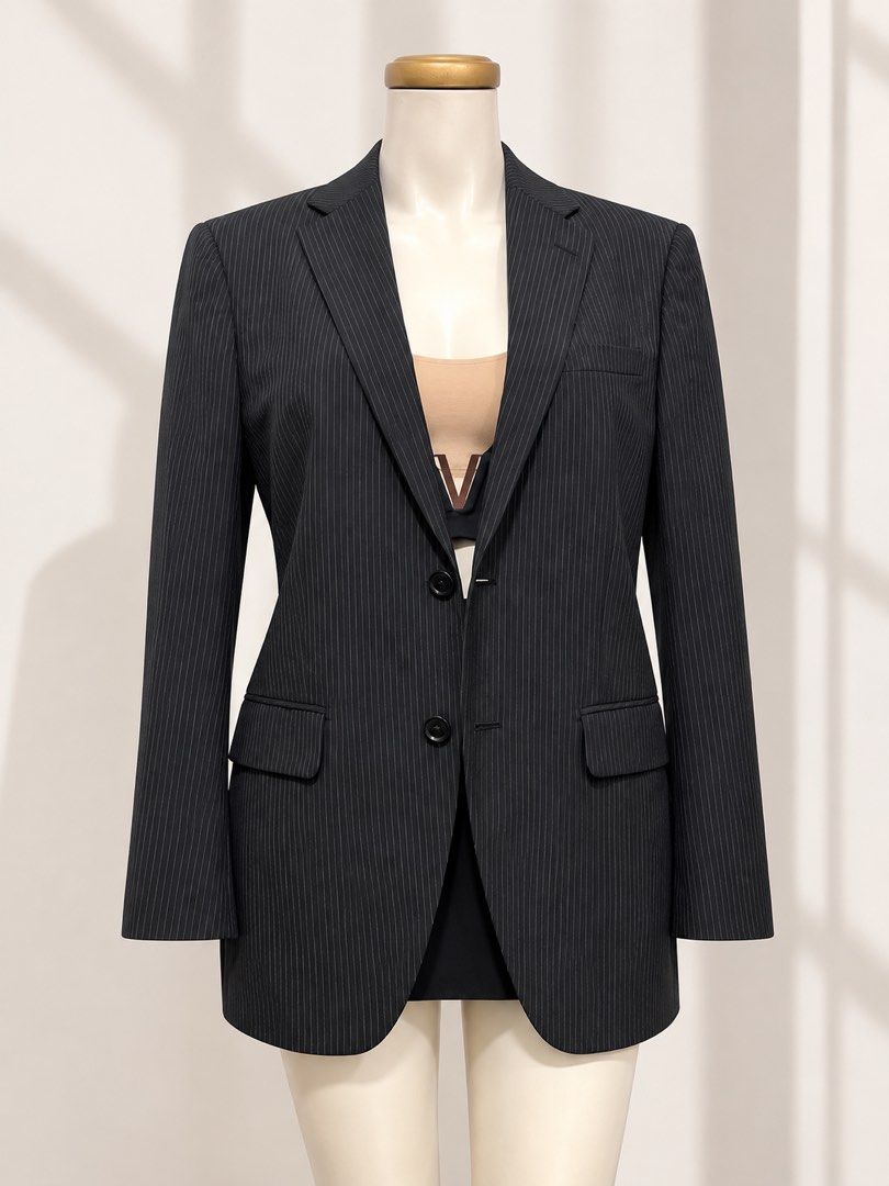 Premium BF Blazer in Black Pinstriped (Category: Coats, Jackets and Outerwear) located in Taguig. Submitted by vm.co (Listing ID 1460262196, Image 1). Description: Perfect for: * Corporate office wear * Business travel * Smart casual outfits * Rainy or cool weather * Capsule wardrobe * Everyday sophisticated styling Condition: Appears to be in very good preloved condition with no visible major stains, tears, or discoloration in the photo. A light
