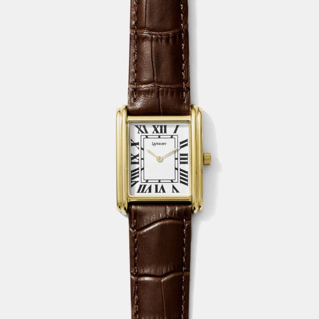 Pre-order / Laphont – Bloc Large Gold Watch (Category: Women's Watches) located in San Antonio. Submitted by melodramaforever (Listing ID 1460270514, Image 2). Description: PRE-ORDER! Laphont – Bloc Large Gold Watch This pre-order requires full payment. ETA to PH: 3-4 weeks upon ordering Strap Color: Black, Brown, Green Details: - Brutalism inspired stepped 14 Karat Gold Plated Stainless Steel Case - Genuine Cowhide Band - Classic Roman Numeral D