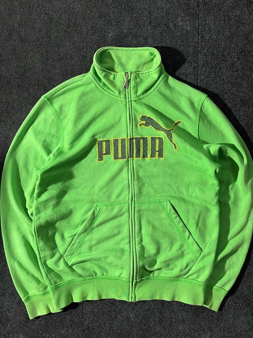 Puma Green Zip-Up Track Jacket (Category: Coats, Jackets and Outerwear) located in Los Banos. Submitted by reworn.clo2026 (Listing ID 1460111369, Image 3). Description: Size: Small-Medium * Width: 20.5 * Length: 25.5 * Good condition.