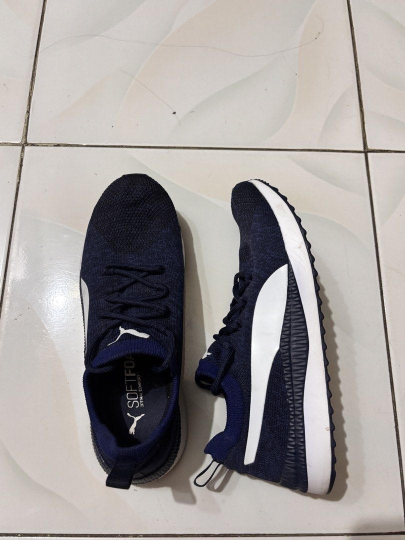 Puma Running Shoes Navy Blue Size US 9 (Category: Sneakers) located in Malasiqui. Submitted by migu.mogu (Listing ID 1460139169, Image 2). Description: - Color: Dark Navy Blue Knit Upper - No Issue, Unused - Features: White Puma Logo & Stripe, Softfoam Optimal Comfort Insoles - Closure: Lace-up - Size: US 9 / EUR 42 / UK 8.