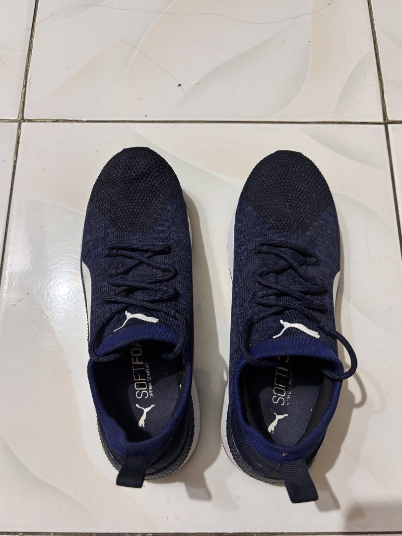 Puma Running Shoes Navy Blue Size US 9 (Category: Sneakers) located in Malasiqui. Submitted by migu.mogu (Listing ID 1460139169, Image 3). Description: - Color: Dark Navy Blue Knit Upper - No Issue, Unused - Features: White Puma Logo & Stripe, Softfoam Optimal Comfort Insoles - Closure: Lace-up - Size: US 9 / EUR 42 / UK 8.