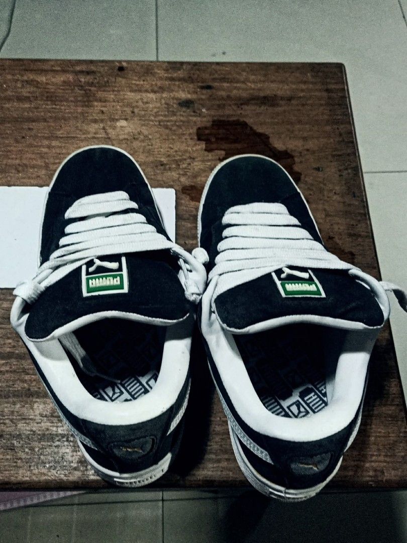 Puma Suede Classic Black White Sneakers (Category: Sneakers) located in Manila. Submitted by jl02205 (Listing ID 1460151464, Image 3). Description: - Classic Puma sneakers in black and white - Suede material with white laces and sole - Ideal for casual wear - A must-have for any sneaker collection.