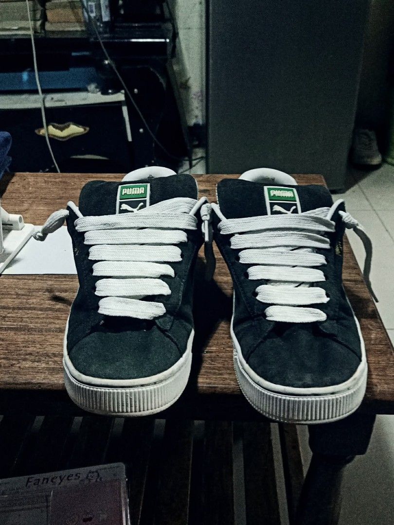 Puma Suede Classic Black White Sneakers (Category: Sneakers) located in Manila. Submitted by jl02205 (Listing ID 1460151464, Image 2). Description: - Classic Puma sneakers in black and white - Suede material with white laces and sole - Ideal for casual wear - A must-have for any sneaker collection.