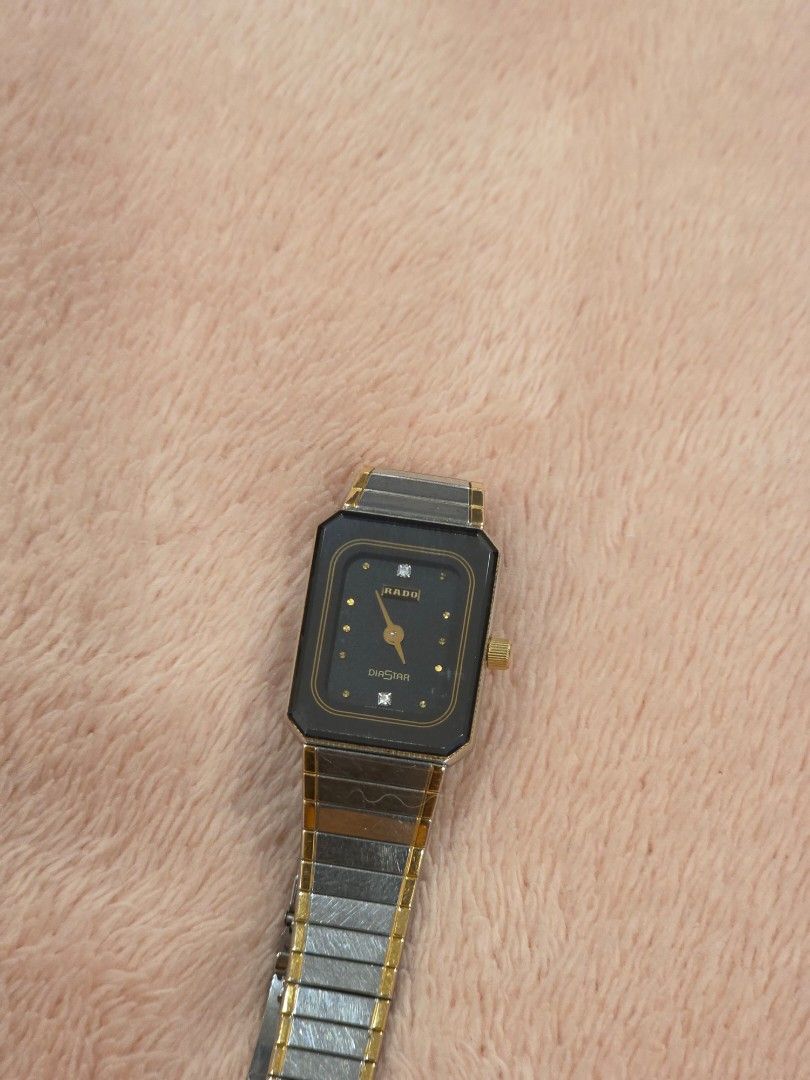 Rado Diastar Watch (Category: Luxury Watches) located in Taytay. Submitted by brightdog.huskies (Listing ID 1460250586, Image 1). Description: - Vintage Rado Diastar watch - Classic rectangular design - Black face with gold accents - Two-tone metal strap - In good working condition - Need battery replacement.