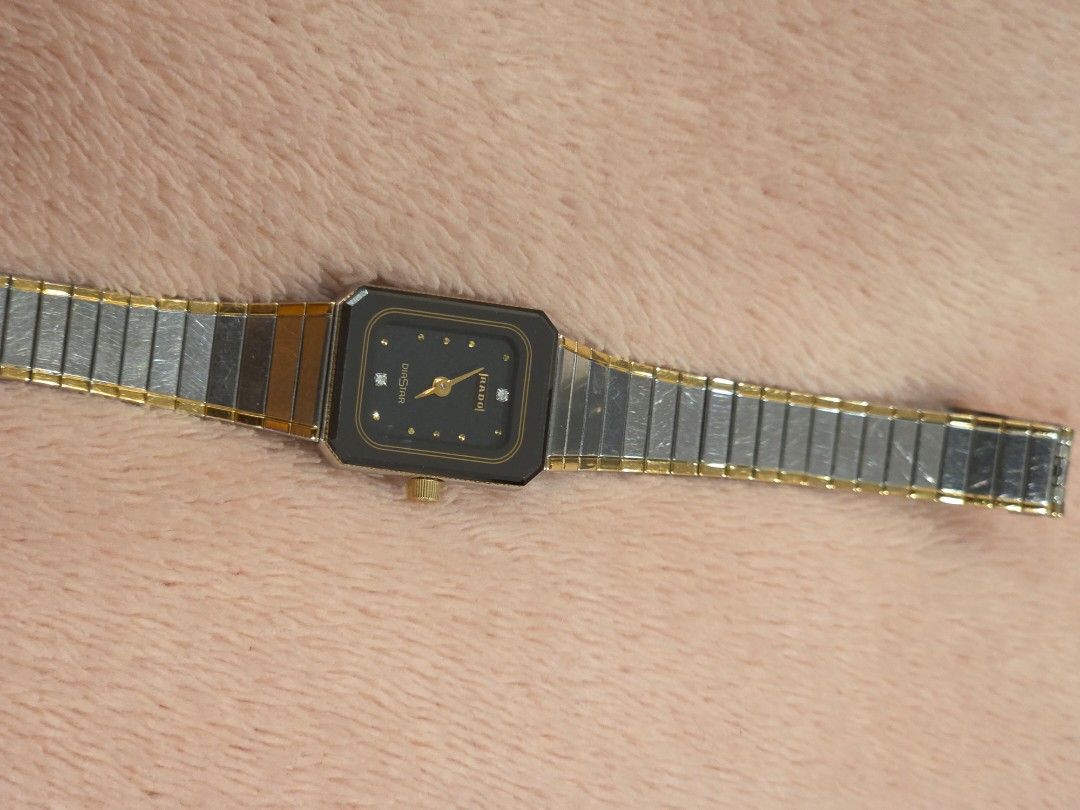 Rado Diastar Watch (Category: Luxury Watches) located in Taytay. Submitted by brightdog.huskies (Listing ID 1460250586, Image 3). Description: - Vintage Rado Diastar watch - Classic rectangular design - Black face with gold accents - Two-tone metal strap - In good working condition - Need battery replacement.