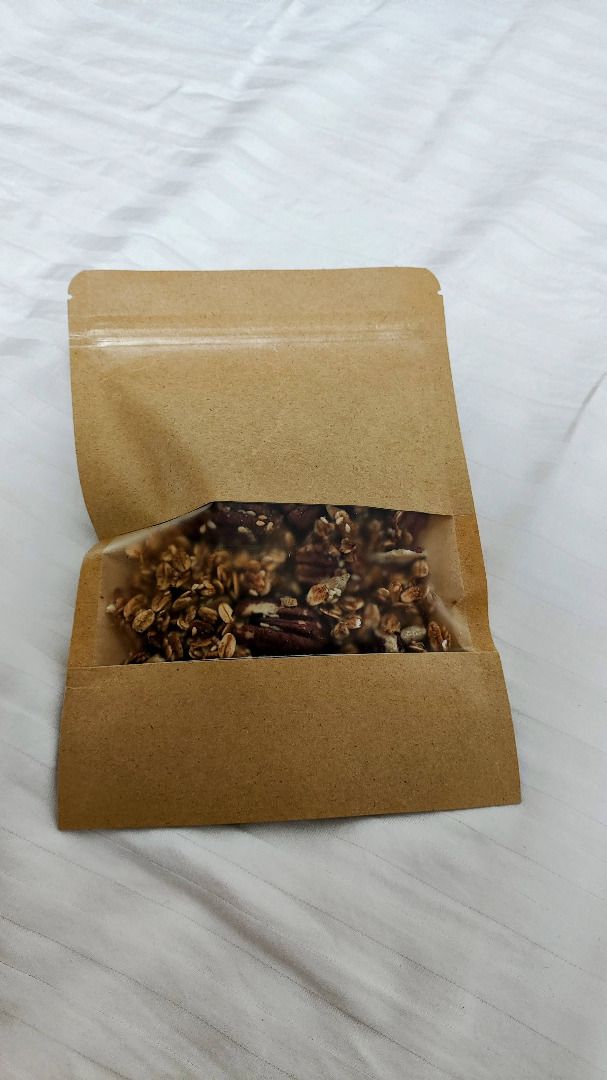 Raisin & Orange Granola — 250g (Category: Homemade Bakes) located in Quezon City. Submitted by robbie923 (Listing ID 1460162008, Image 2). Description: 🍊 Raisin & Orange Granola — 250g Crunchy homemade granola with sweet raisins, toasted oats & pecans, sunflower and sesame seeds, with a delicious hint of orange, honey, and maple syrup. 🍊🍯 * Picture has dried mangoes which are not available ✨ Perfect for: 🥣 Breakfast & yogurt 🥛 Milk & smoothi
