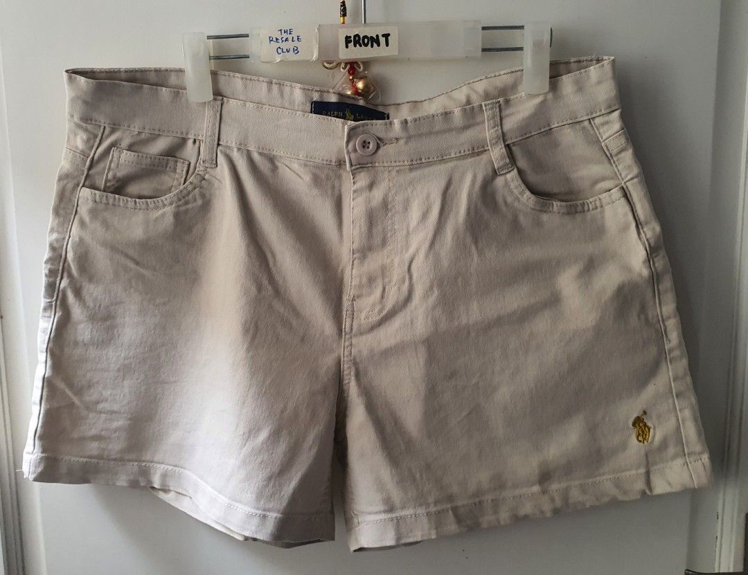 Ralph Lauren Beige Chino Shorts Size 36 (Category: Shorts) located in Tarlac. Submitted by resaleclub (Listing ID 1460147713, Image 1). Description: - Brand: Ralph Lauren - Color: Beige - Size: 36 - Style: Classic Chino Shorts - Features: Button closure, pockets - Ideal for: Casual wear - Measurements: Waist 36", Length 16" - Origin: Made in Bangladesh.