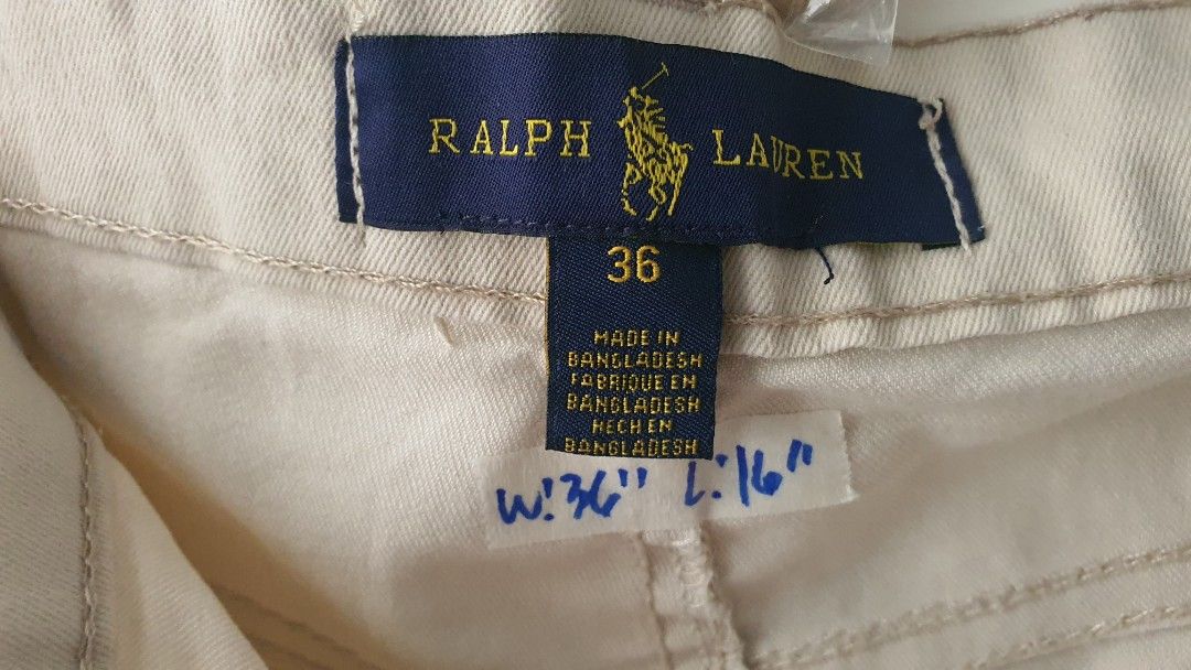 Ralph Lauren Beige Chino Shorts Size 36 (Category: Shorts) located in Tarlac. Submitted by resaleclub (Listing ID 1460147713, Image 3). Description: - Brand: Ralph Lauren - Color: Beige - Size: 36 - Style: Classic Chino Shorts - Features: Button closure, pockets - Ideal for: Casual wear - Measurements: Waist 36", Length 16" - Origin: Made in Bangladesh.