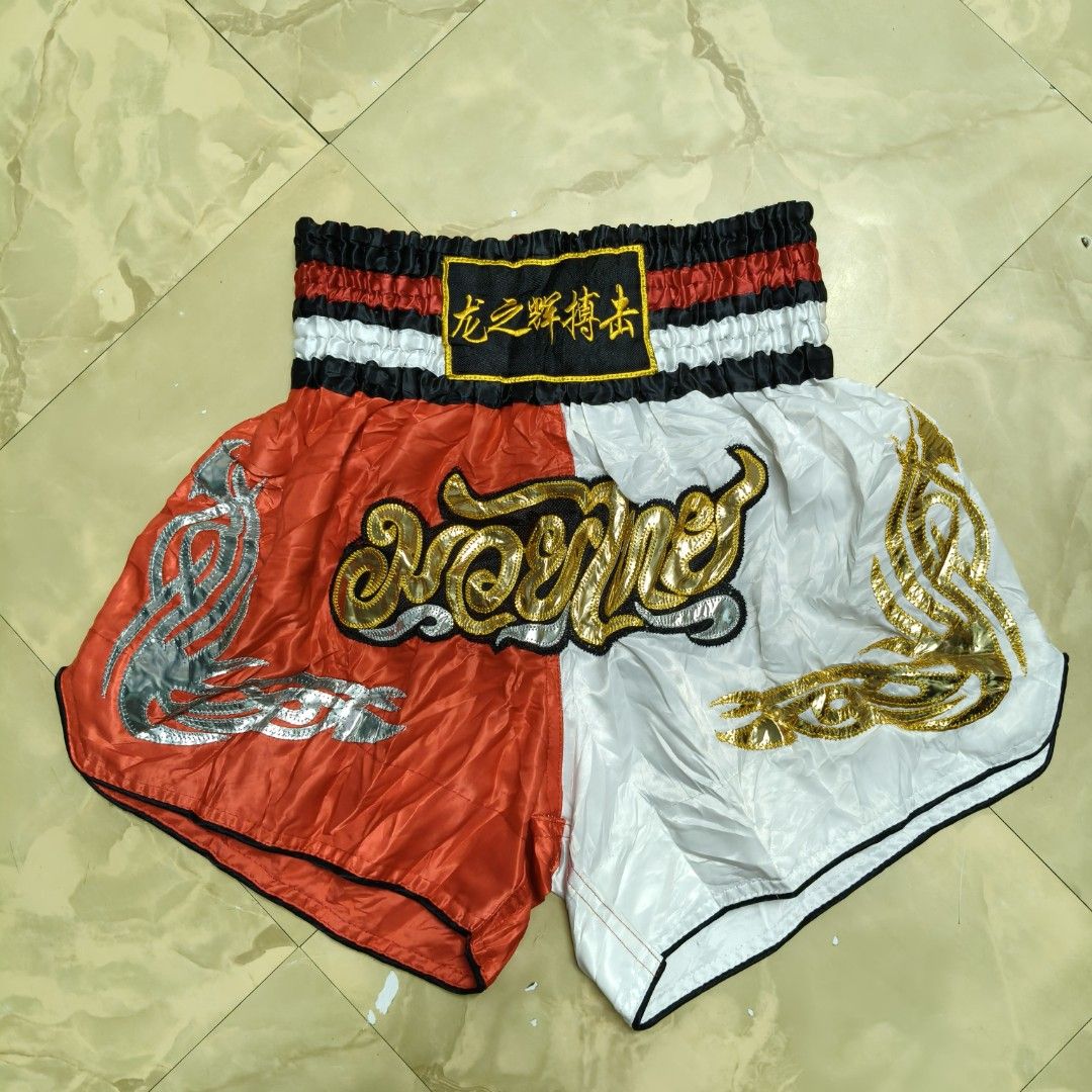 Red and white split-color Muay Thai Shorts (Category: Shorts) located in Rizal. Submitted by closefit (Listing ID 1460247391, Image 2). Description: READ ME ❣ Accessories not included 💝 On hand and ready to ship. 💢 Actual color may vary due to lightning. 💦 I advise to wash the item before using. 💦 FIRST ONE TO PAY GETS THE ITEM. 🦴 Materials: 100% polyester ‼️ Medium MOP: ‼️ GCASH ‼️ Bank transaction Loc: ‼️ Cainta Rizal.