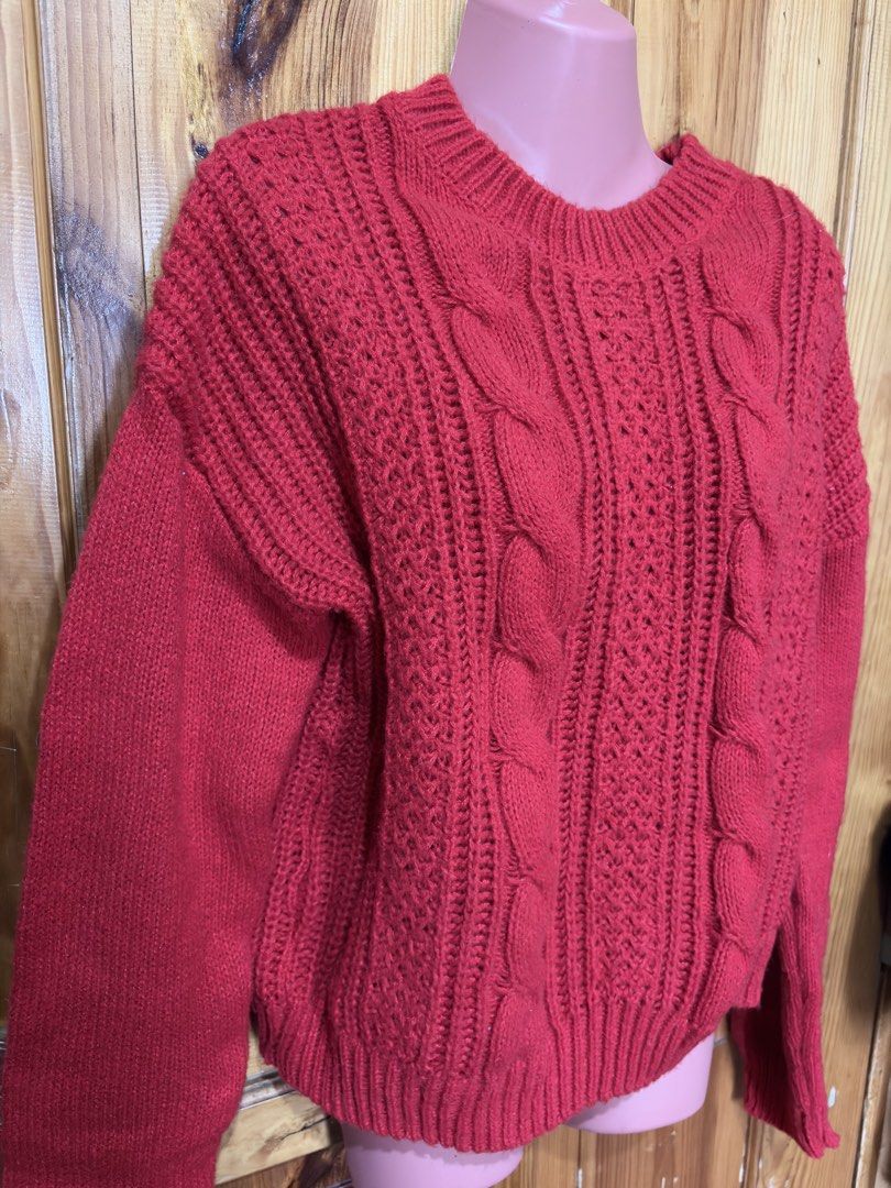 Red Cable Knit Sweater (Category: Coats, Jackets and Outerwear) located in Baguio. Submitted by declutterbycys (Listing ID 1460121337, Image 2). Description: - Cozy red sweater - Classic cable knit design - Comfortable crew neck - Perfect for layering or wearing alone - Ideal for cooler weather - Pairs well with jeans or skirts Note: Color may vary due to lighting.