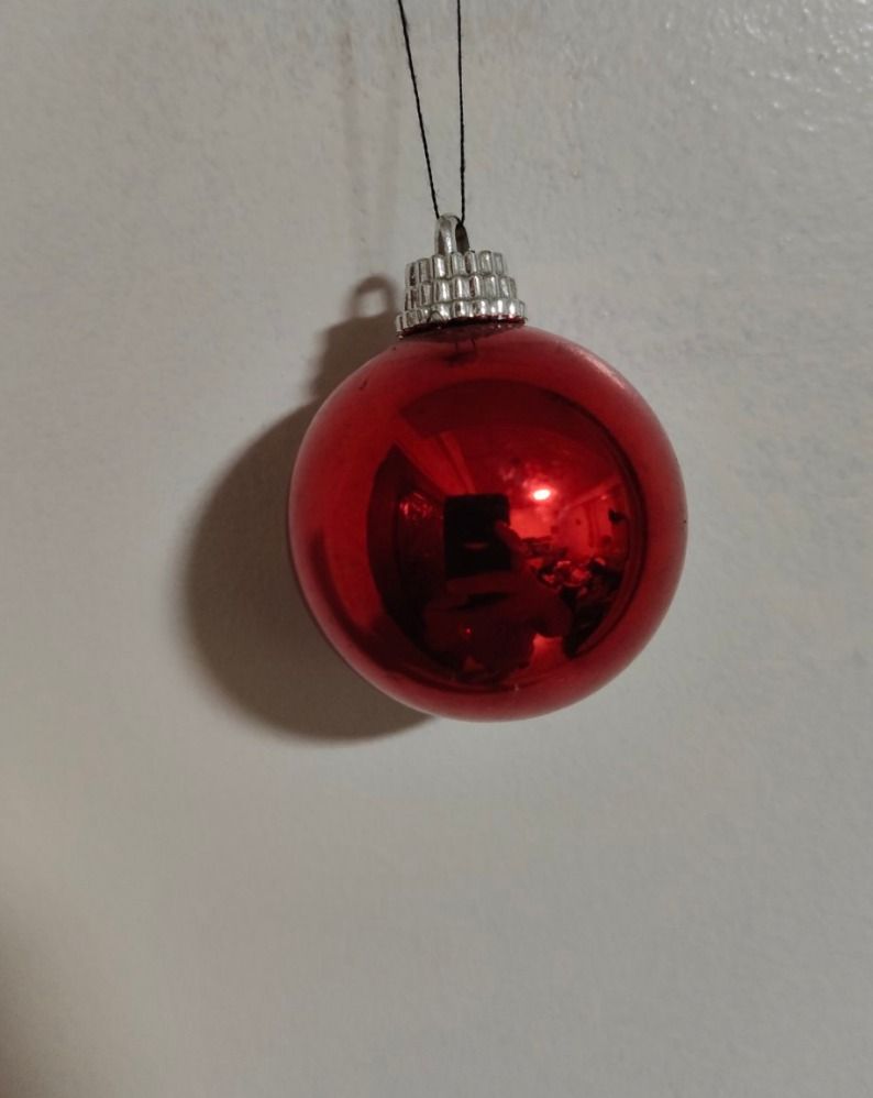 XMAS DISCOUNT!!! Red Christmas Balls Ornament with Silver Cap (Category: Other Home Decor) located in Quezon City. Submitted by oddduck02 (Listing ID 1460155926, Image 1). Description: - Shiny & Matte Red Christmas ornament - Features a silver cap on top - Ready to hang on your Christmas tree - 14pcs. - Approximate Size = 4cm. - Reason for Selling = Cleaning house .