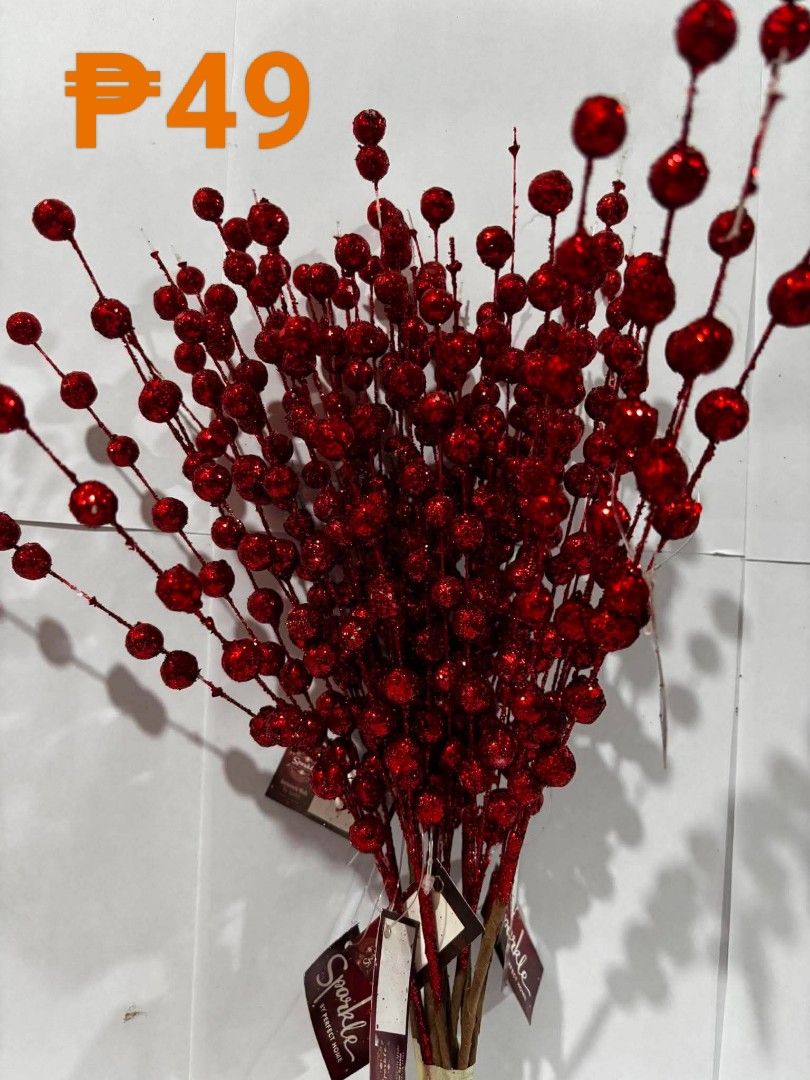 Red Glittery Berry Stems (Category: Artificial Plants & Flowers) located in Quezon City. Submitted by delacruzjp546 (Listing ID 1460191977, Image 1). Description: - Festive red glittery berry stems - Perfect for Christmas arrangements and holiday crafting - Features numerous small, shiny red berries - Brand: Sparkle by Perfect Home - Price: P49.