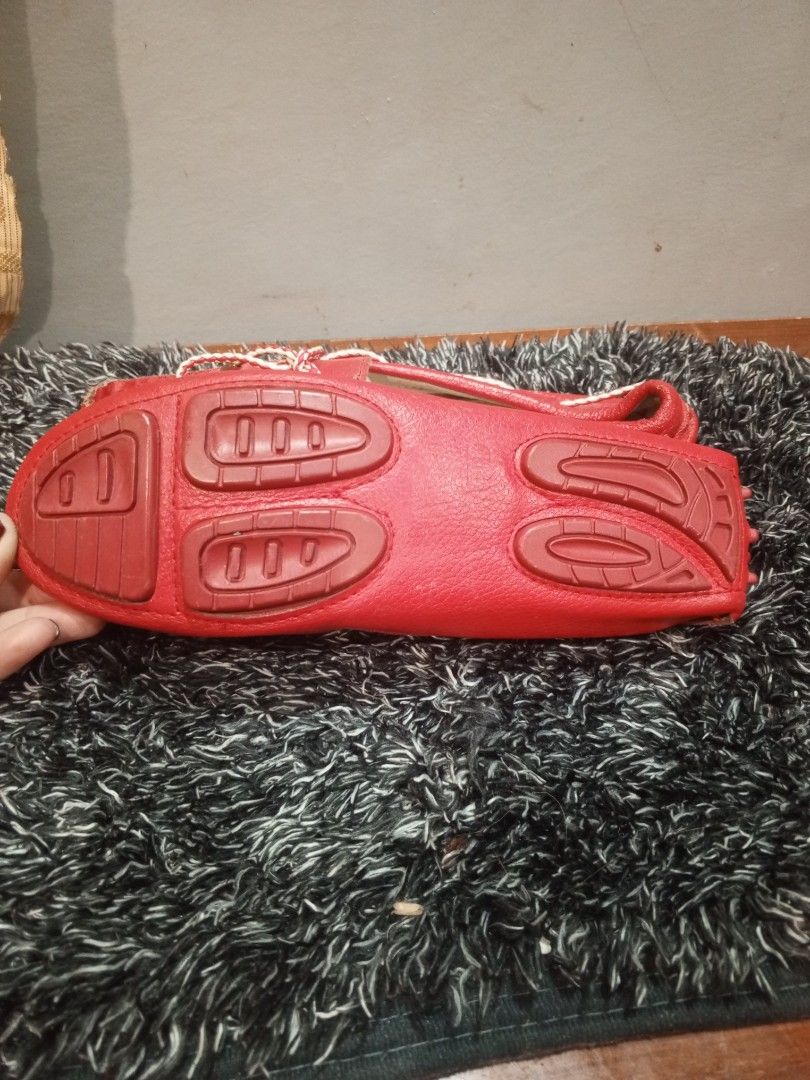 Red Leather Moccasins (Category: Loafers) located in Manila. Submitted by arianne070692 (Listing ID 1460292811, Image 3). Description: - Classic red leather moccasins - Easy slip-on style - Features white laces for a stylish touch - Textured grip sole for added traction - Size: 240 (equivalent to 1.5) - Origin: Made in China - Ideal for casual wear.