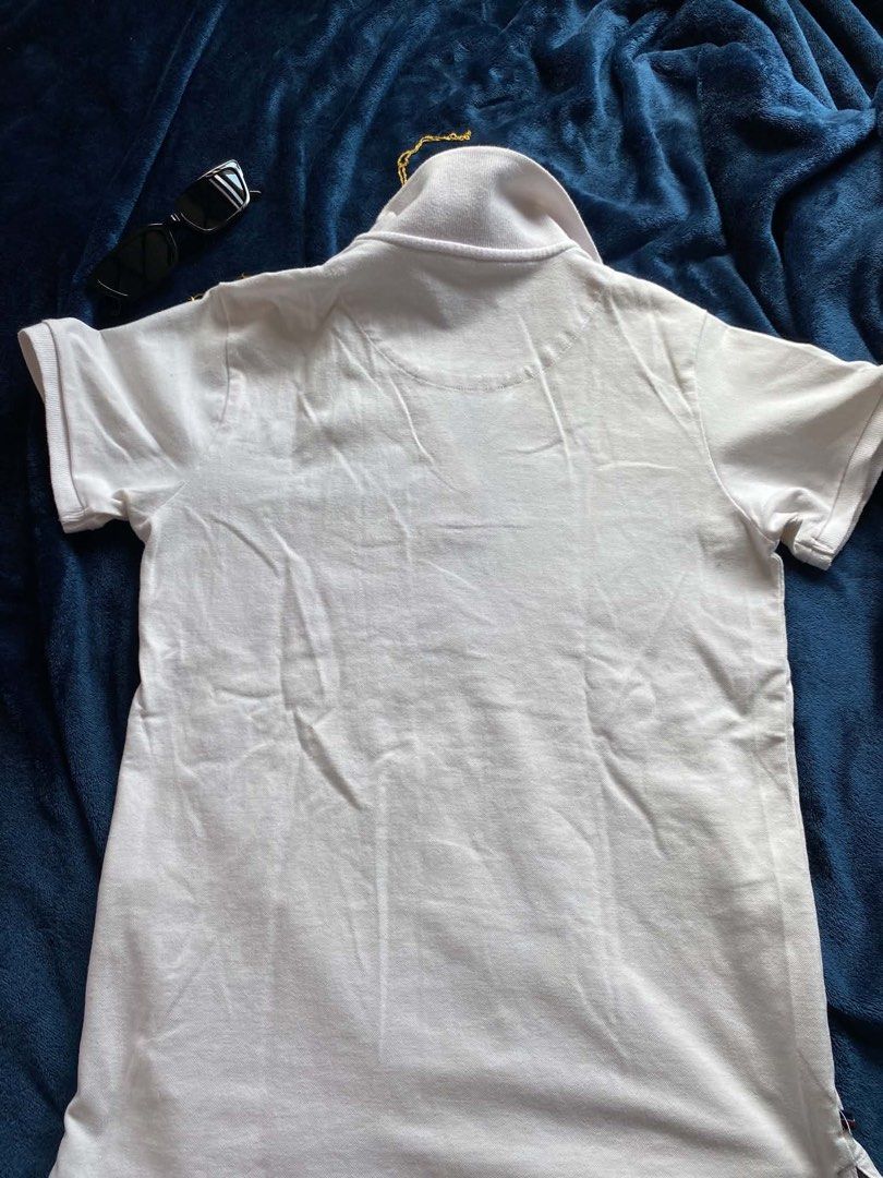 Regatta Essentials White Polo Shirt Size S (Category: Tshirts & Polo Shirts ) located in Manila. Submitted by lesjury (Listing ID 1460221666, Image 2). Description: - Brand: Regatta Essentials - Color: White - Features: Small embroidered logo on chest - Collar: Striped detail - Sleeves: Short - Style: Casual wear - RFS: Do not need it anymore.