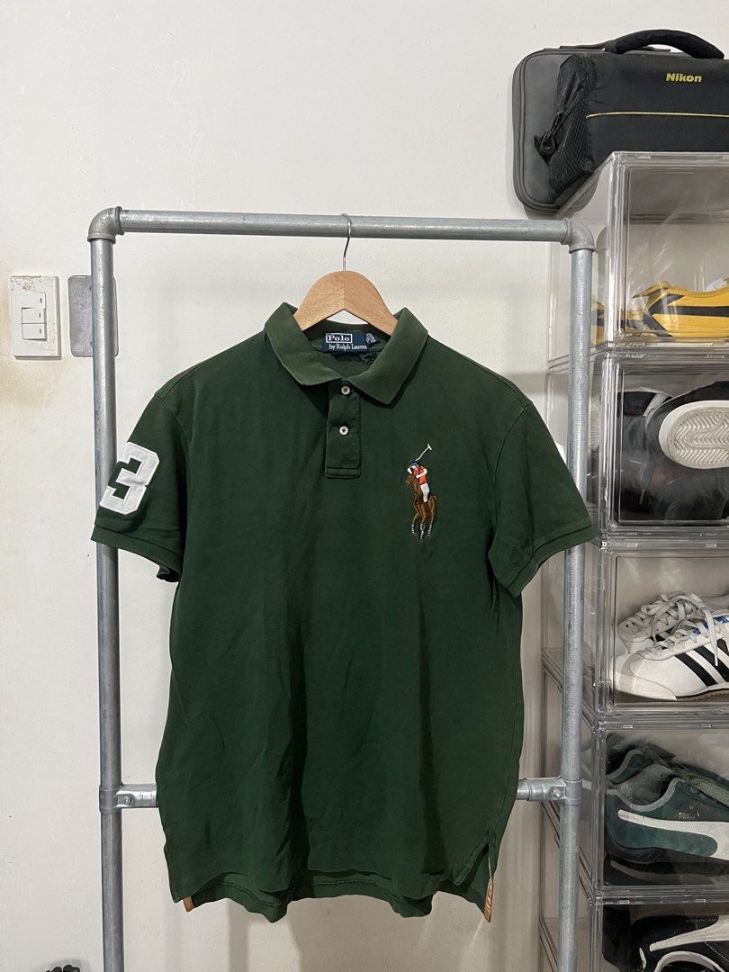 Ralph Lauren Hunter Green Polo (Category: Tshirts & Polo Shirts ) located in Angono. Submitted by odd.fitt (Listing ID 1460294594, Image 1). Description: Medium 20W 26-28L Repaired hole, unnoticeable when worn (Under collar) .