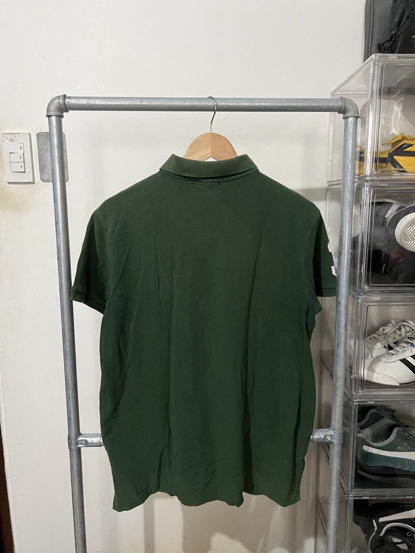 Ralph Lauren Hunter Green Polo (Category: Tshirts & Polo Shirts ) located in Angono. Submitted by odd.fitt (Listing ID 1460294594, Image 2). Description: Medium 20W 26-28L Repaired hole, unnoticeable when worn (Under collar) .
