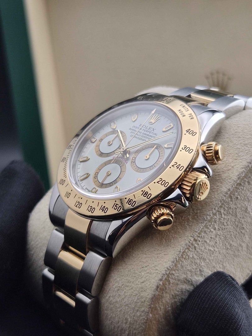 Rolex Daytona Two-Tone (Category: Men's Watches) located in Makati City. Submitted by tpx.ph (Listing ID 1460146831, Image 3). Description: Rolex Daytona Two-Tone 2001 960k Cash Price Ref. 116523 Good Condition Watch Only 💵 We buy, sell and trade watches. 📄 Moneyback Guarantee on Authenticity of the watch 🔧 All timepieces have been checked & serviced and include a 1 Year TPX Service Warranty. 🌐 tpx.com.ph 📍 Boutique: G/F | New World Makati H