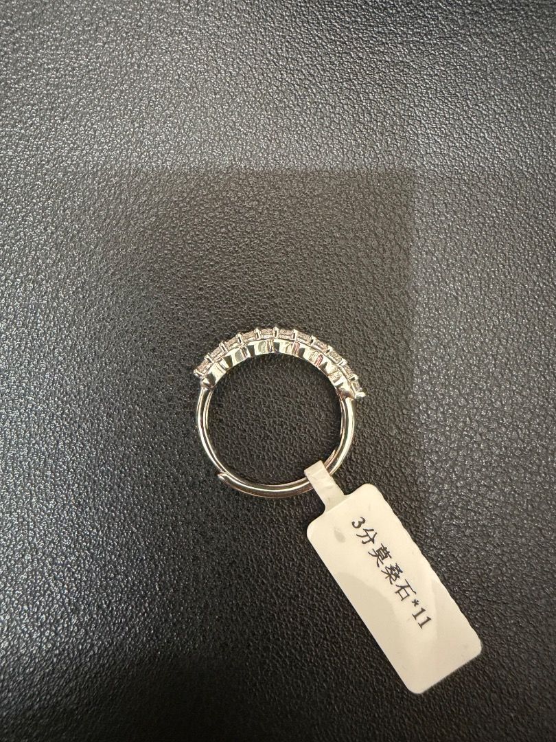 S925 Sterling Silver Ring with Moissanite Diamonds (Category: Rings) located in Caloocan City. Submitted by annah001 (Listing ID 1460172418, Image 3). Description: - Genuine S925 Sterling Silver adjustable band, fits size 5-9 - Features a row of sparkling synthetic diamonds - Delicate and comfortable band for everyday wear - Comes with GRA certificate.