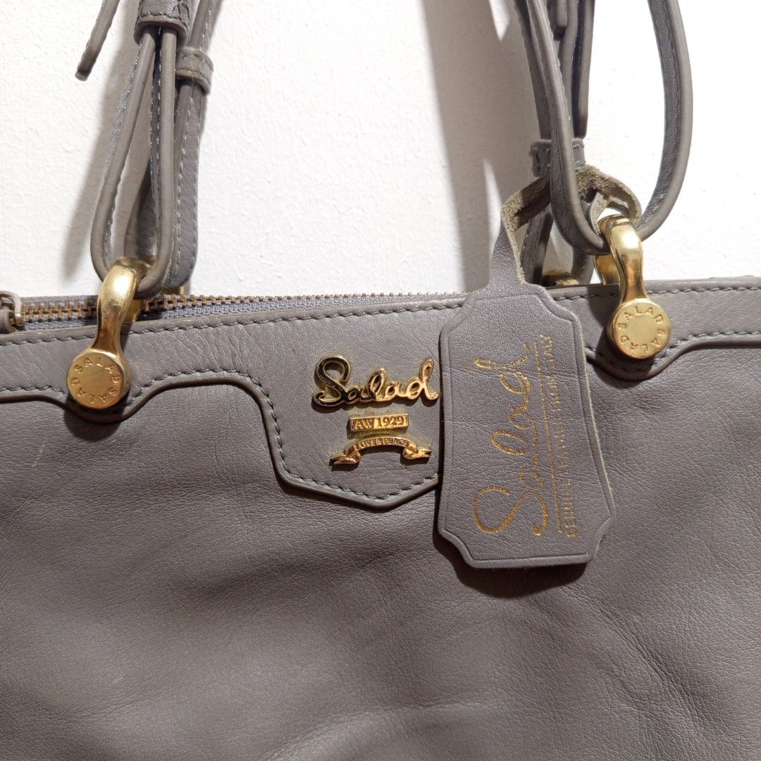 Salad Grey Leather Shoulder Bag (Category: Shoulder Bags) located in Manila. Submitted by hezzy.ph (Listing ID 1460301833, Image 2). Description: Salad leather hand/sling bag semi-medium size great for school or office well used needs polishing.