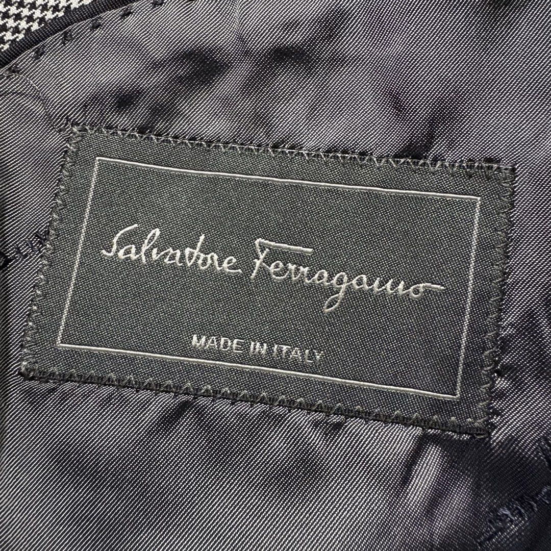 Salvatore Ferragamo Grey Plaid Wool Blazer (Category: Coats, Jackets and Outerwear) located in Tayabas. Submitted by tayabaskartell (Listing ID 1460206848, Image 3). Description: Salvatore Ferragamo Grey Plaid Wool Blazer Category: Designer / Luxury / Tailoring Material: Shell: 100% Wool Lining: 100% Cupro Description Salvatore Ferragamo tailored blazer featuring a classic grey plaid pattern and structured silhouette. The jacket retains its origi