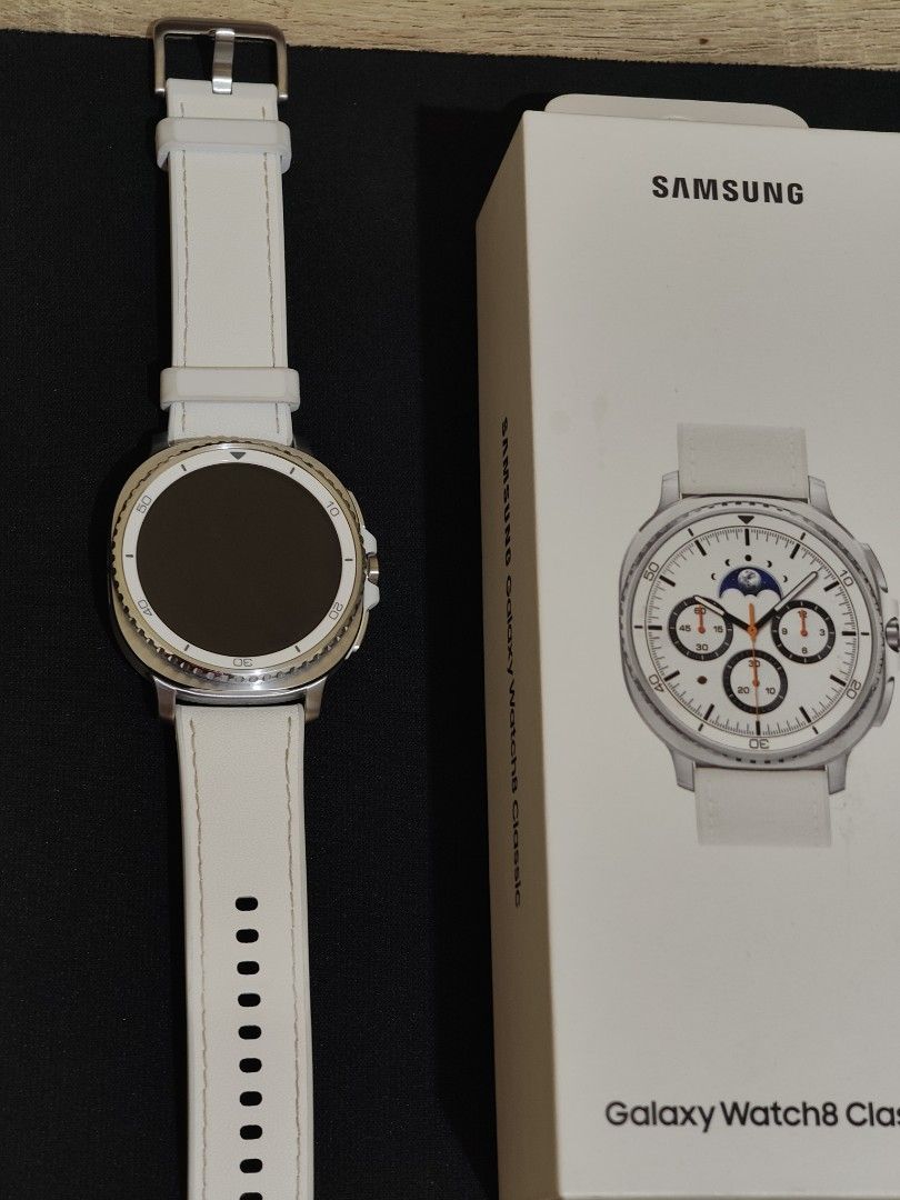 Samsung Galaxy Watch 8 Classic White (Category: Wearables & Smart Watches) located in Manila. Submitted by bartyen (Listing ID 1460143342, Image 3). Description: - Samsung Galaxy Watch 8 Classic White - Model: SM-L500 - Size: 46mm - Features: Sapphire Crystal, GPS - Water Resistance: 5 ATM - 64gb storage -only 2months of use, cleaned everyday - Includes: Original Box, White Strap.