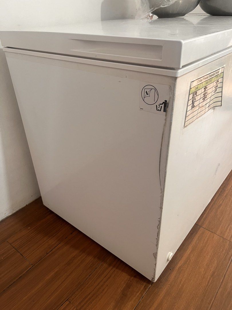 Sanden Chest Freezer SNH0455P (Category: Refrigerators and Freezers) located in Quezon City. Submitted by karmela.martin (Listing ID 1460109595, Image 2). Description: - Sanden SNH0455P Chest Freezer - Good storage capacity for frozen items - Door seal has rust and some damage - Interior is mostly clean with minor ice buildup - Fully functional and keeps food frozen.