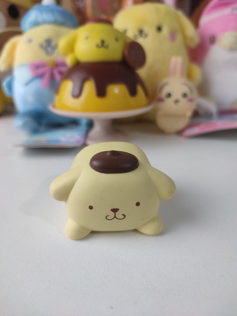 Sanrio Pompompurin Pudding Figure (Category: Designer & Blind Box Toys) located in Manila. Submitted by epicmountain-f20453 (Listing ID 1460139937, Image 2). Description: - Adorable Pompompurin figure in its classic pudding design. - Authentic 2024 Sanrio merchandise. - Compact and collectible size, ideal for display. - A must-have for Pompompurin enthusiasts and collectors. - Proudly made in China..